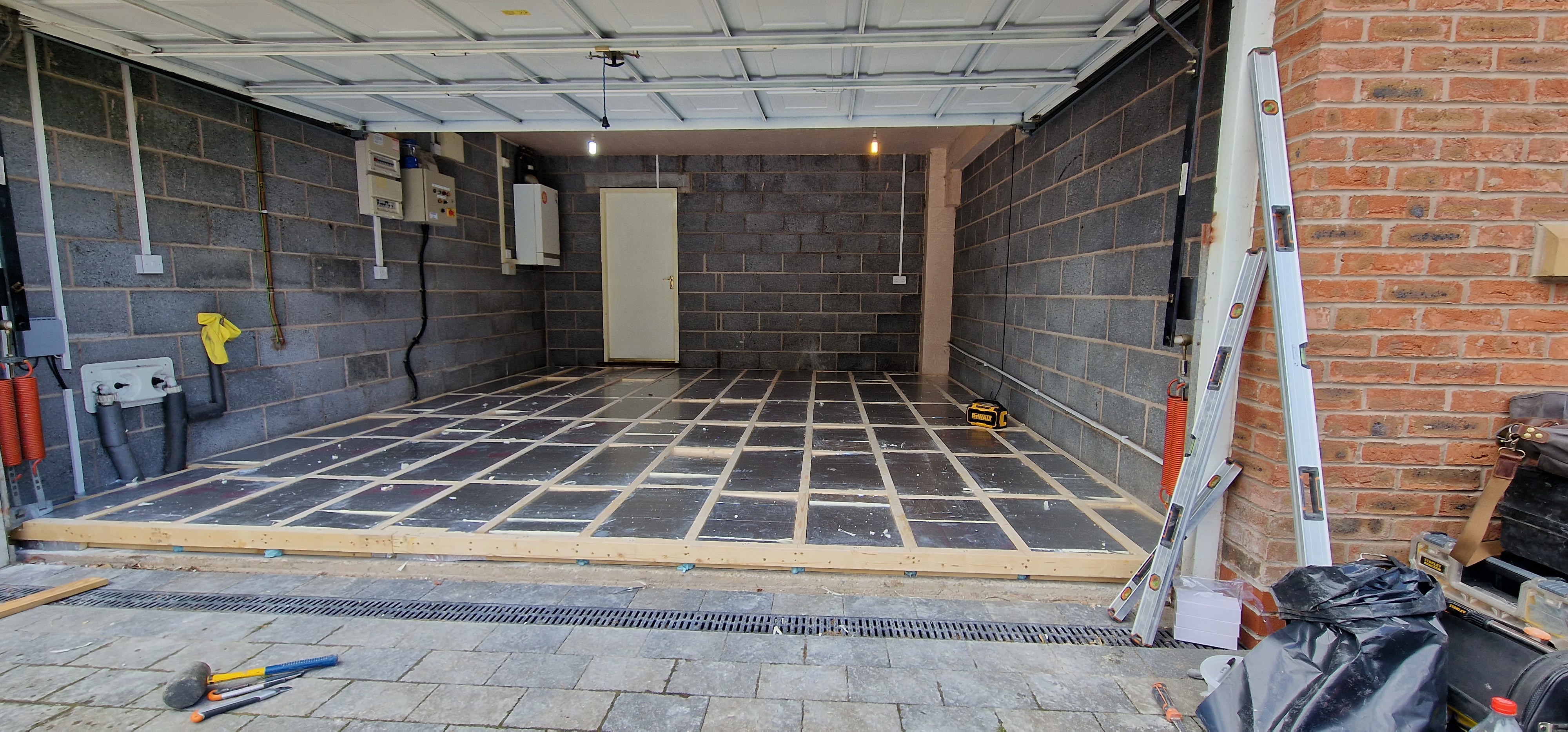 Garage to Bicycle Cleaning Room Conversion